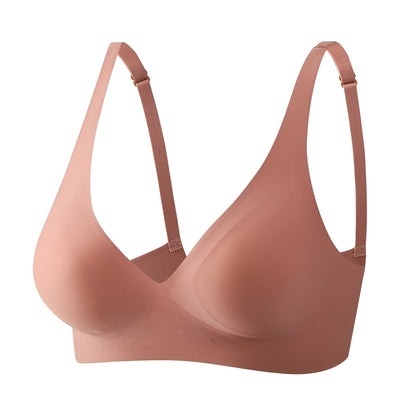 Pink bra on a white background
