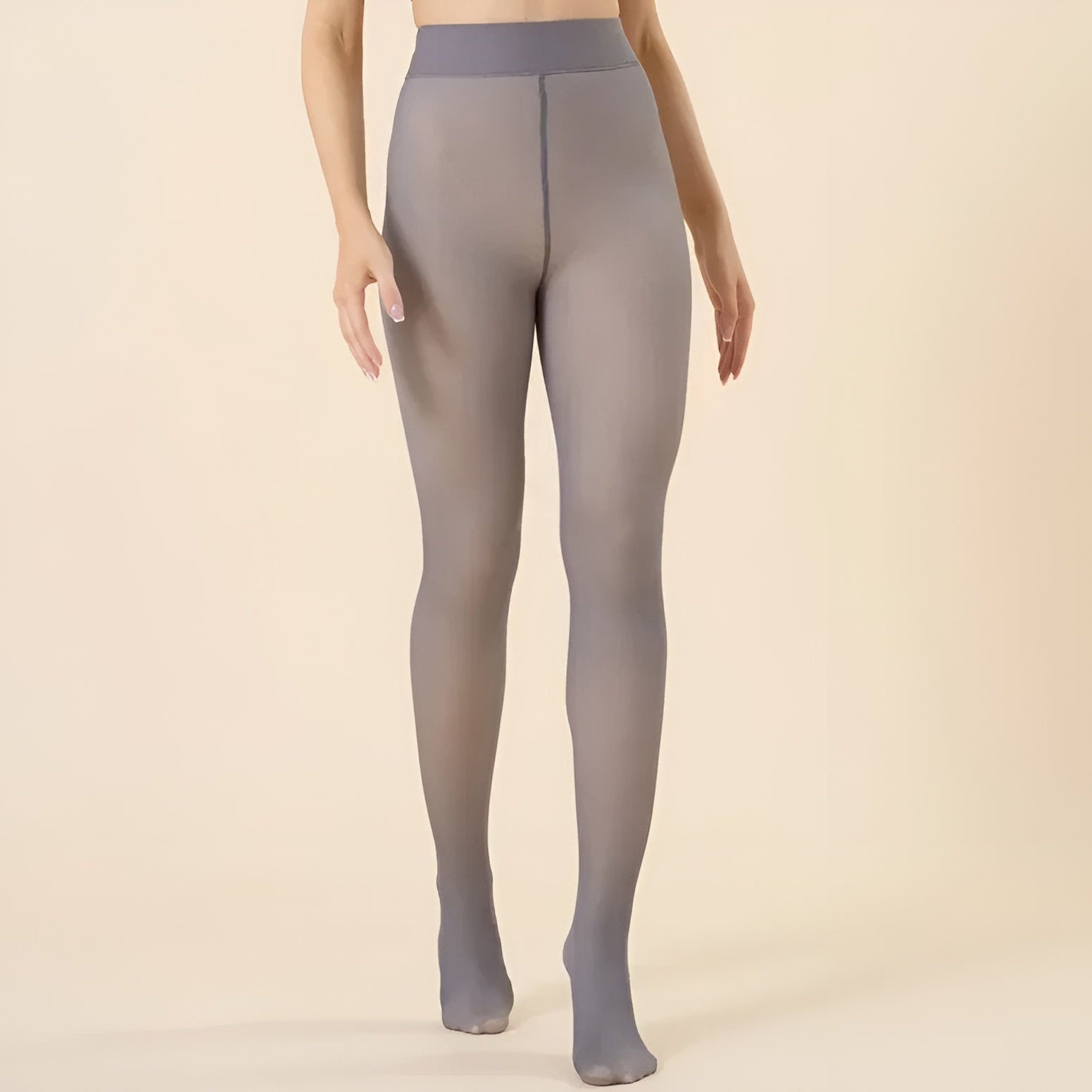 Gray tights worn by a person on a beige background