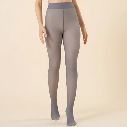 Gray tights worn by a person on a beige background